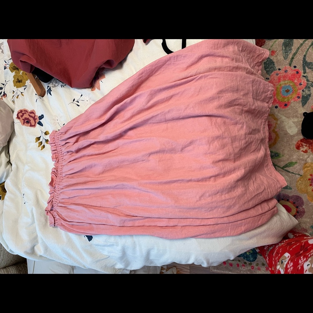 Pink midi skirt with pockets